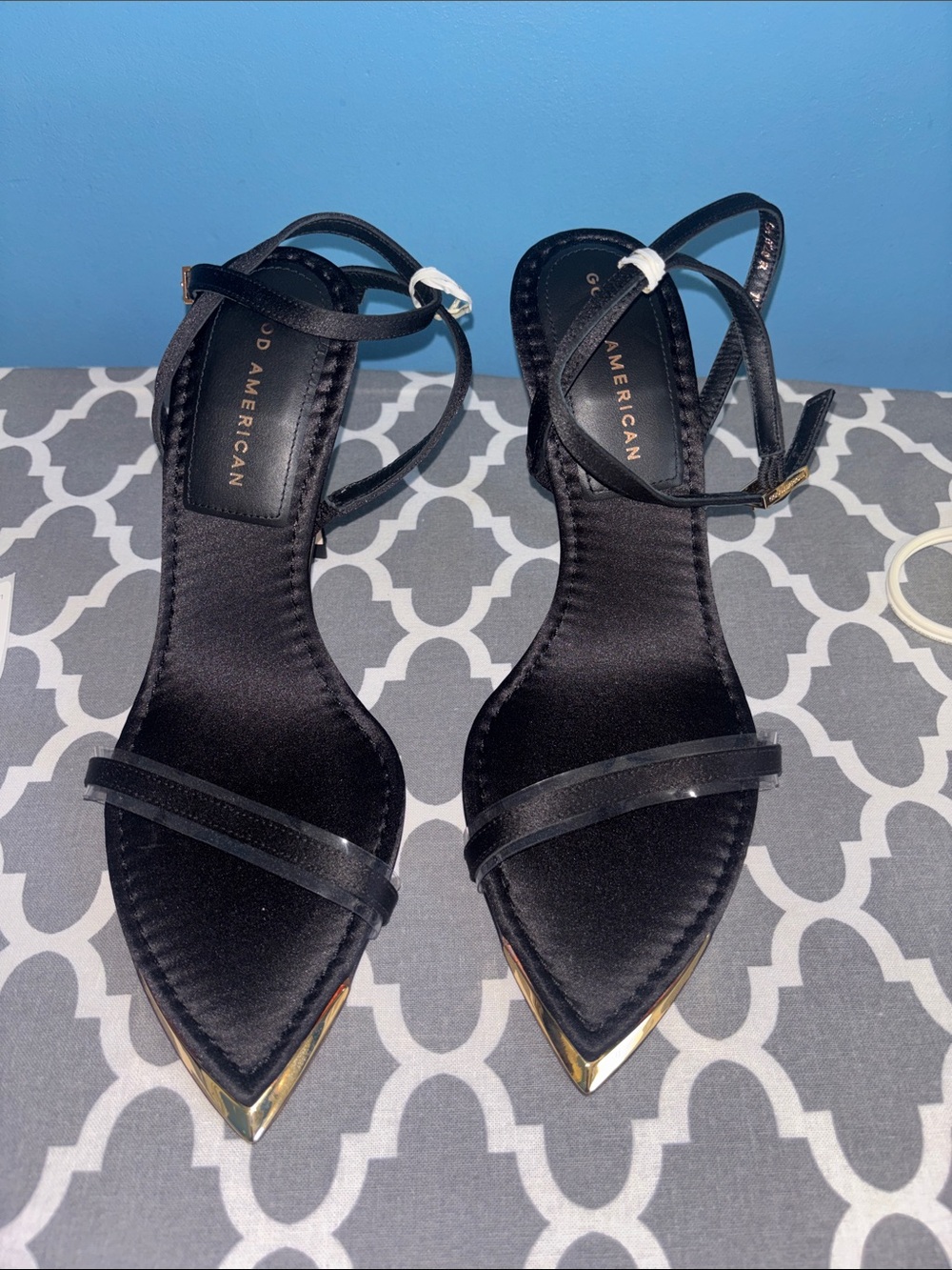Good American Black Pointed Ankle-Strap Heels with Gold Toe Accent